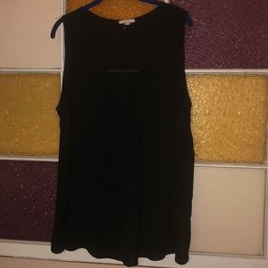 Sheer black sleeveless tee perfect under blazer